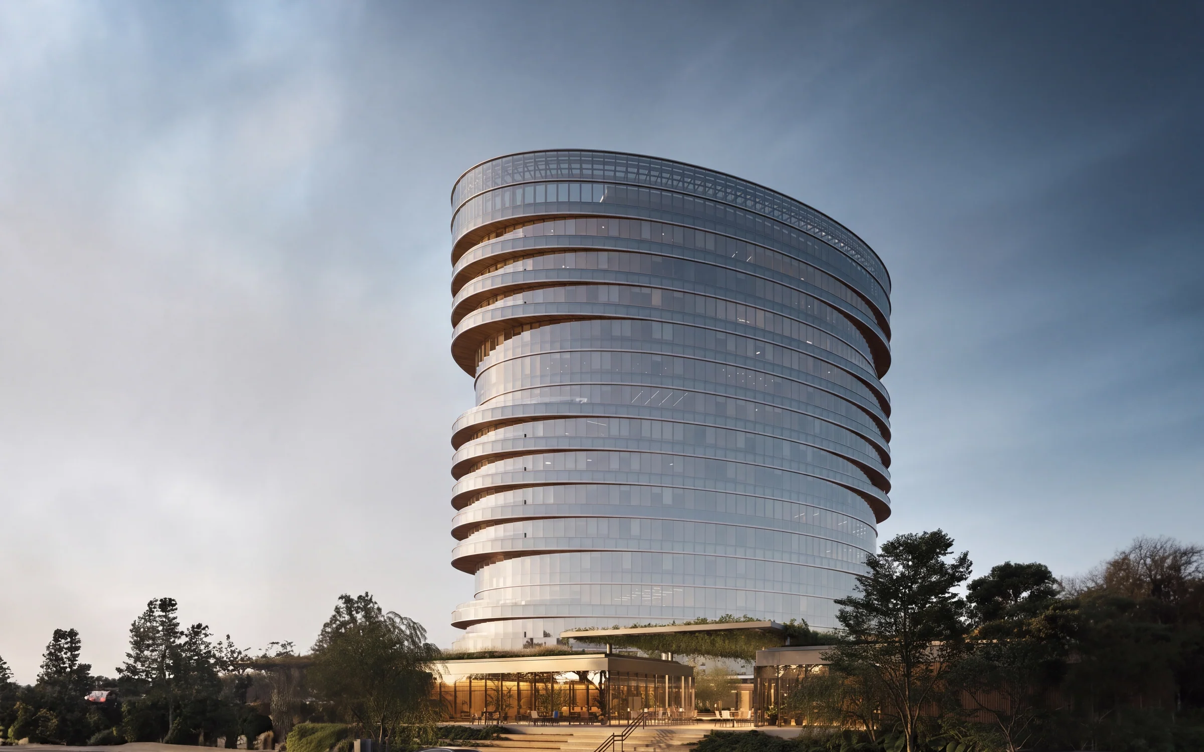 Country Tower, com fachada envidraçada curva e pavimentos de contorno arredondado.